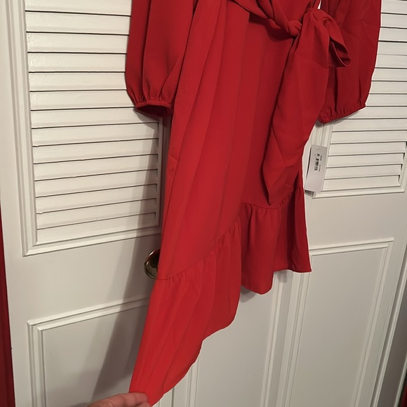 Donna Morgan Women's Long Sleeve Asymmetrical Hem Flounce Dress w/tie fluttering - Picture 6 of 10